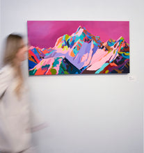 Load image into Gallery viewer, Blurred image of artist, Laura Jane Klassen walking by her pink 'Kiss and Freedom' painting in a gallery
