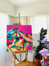 Load image into Gallery viewer, Bright pink, colourful abstract mountain painting on an easel in Studio LJK.